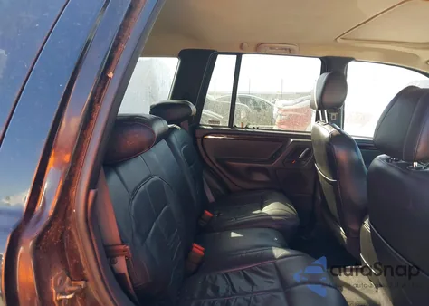 2001 Jeep Grand Cherokee Limited из США, поврежденный, VIN 1J4GW58N81C574401